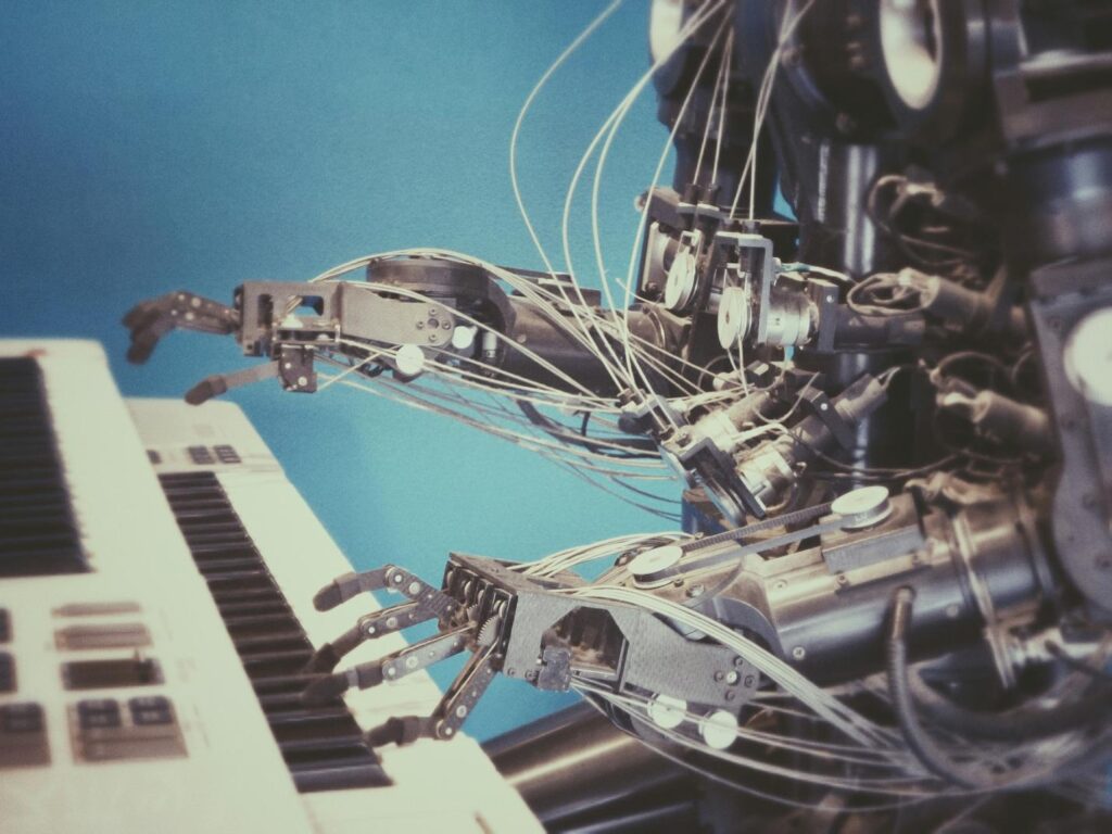 A robot playing a piano Description automatically generated